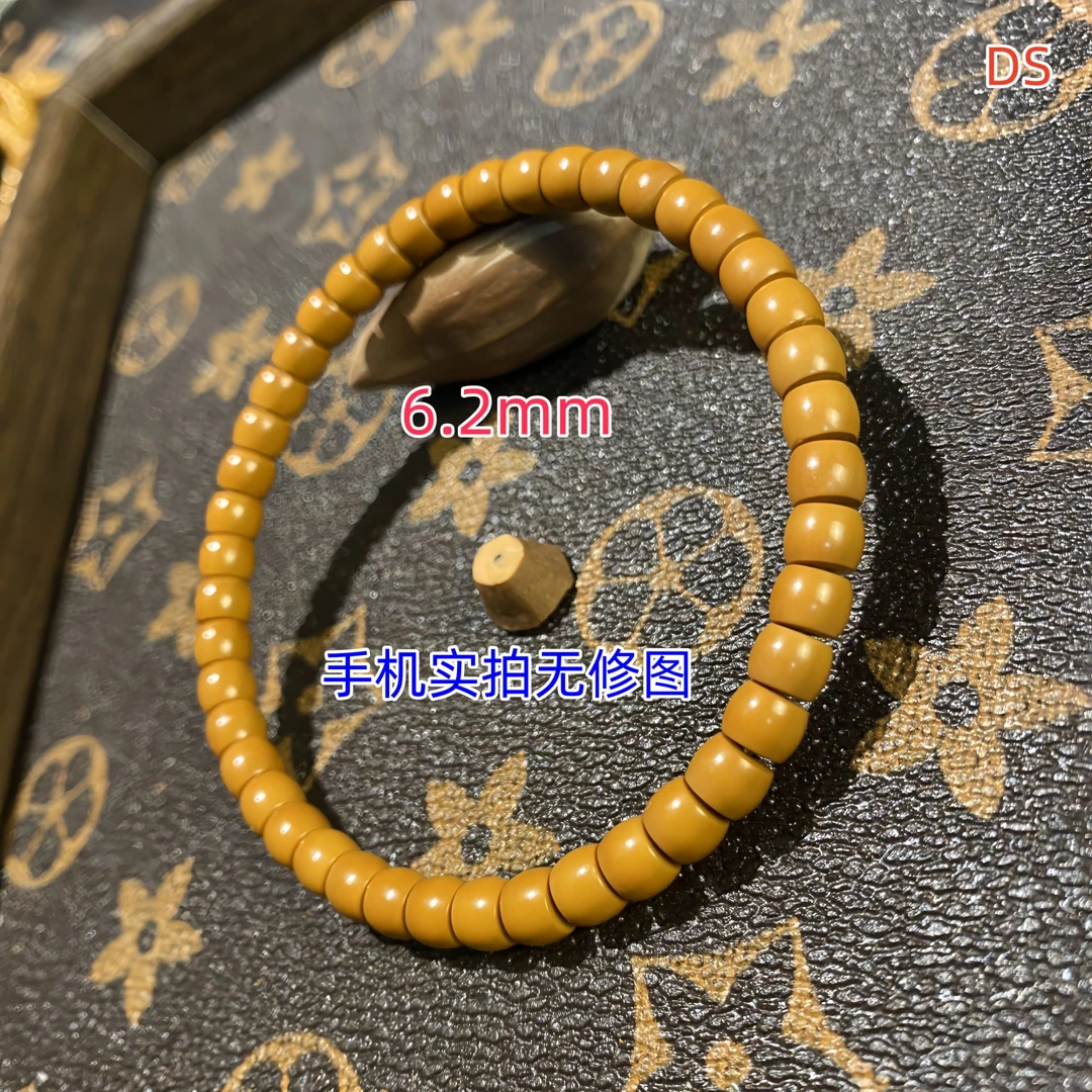 【大帅】6.2mm橄榄核全品无白无瑕精工直切核尖单圈手串