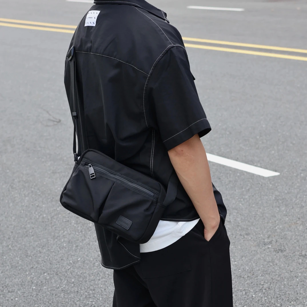 左千户包休闲新款斜挎包牛津布男小包多夹层小方包轻便防水小挎包