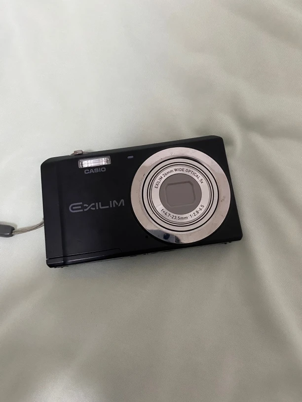 9新 Casio/卡西欧 zs5黑色1400w像素ccd数码相机