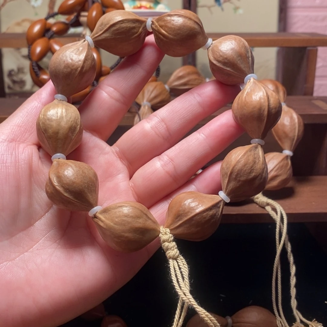 橄榄核手串/手链2.1三花素串10颗