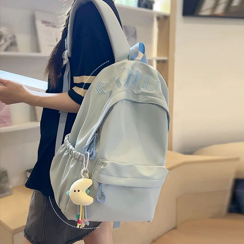 小众书包女高中大学生简约大容量双肩包初中生小学生减负轻便背包