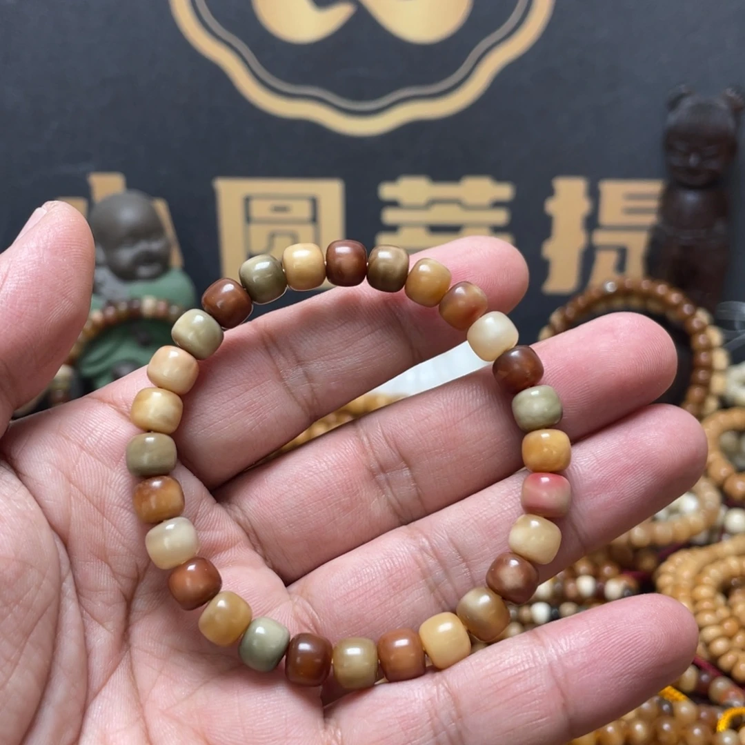 暗***冻龙眼菩提吊坠龙脊菩提8*7老型新料玉化多宝无科技