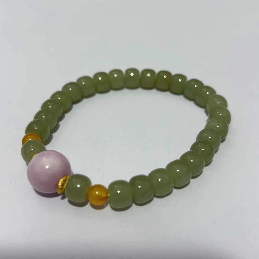 铜合金手链 15616 单颗紫理。小田算盘珠。串