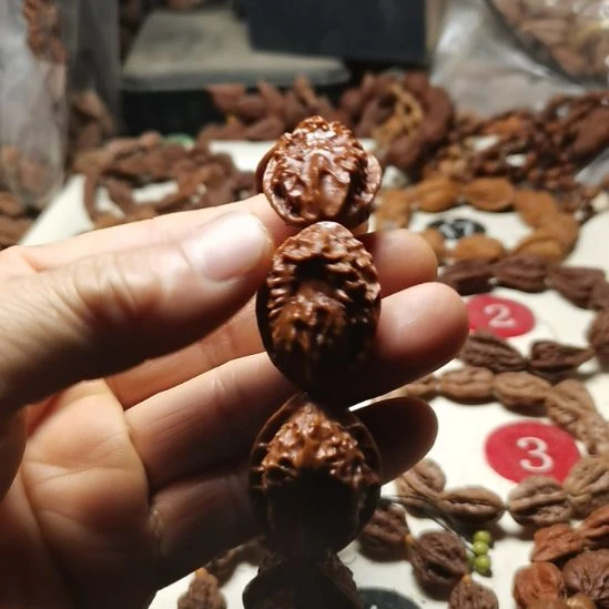 文玩核桃吊坠东北楸异形籽鬼脸20