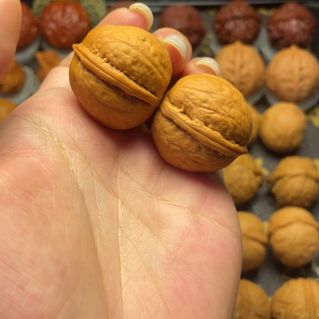 文玩核桃把件金佛