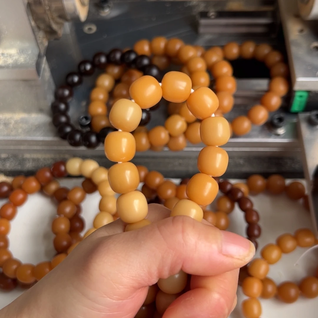 羽***球吊坠菩提根/象牙果