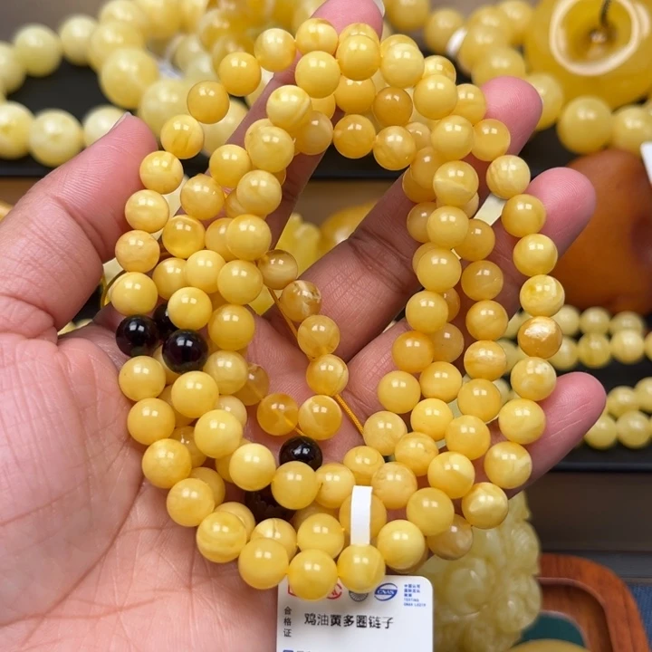 琥珀未镶嵌珠宝奇石M56号7.8+鸡油黄妖花