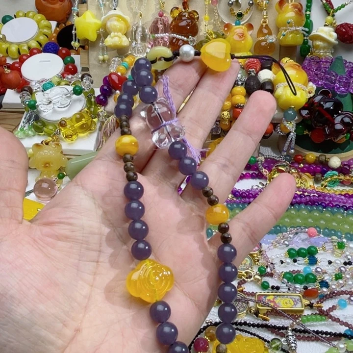 早***哈40号烟紫设计款手机挂链