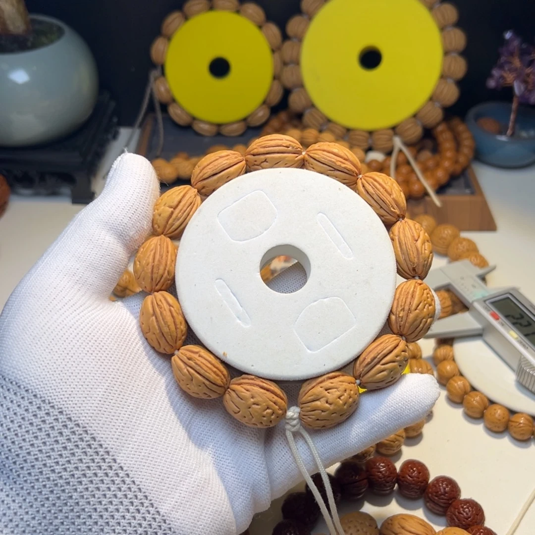 泓***泓手串桃核奶油钱袋子