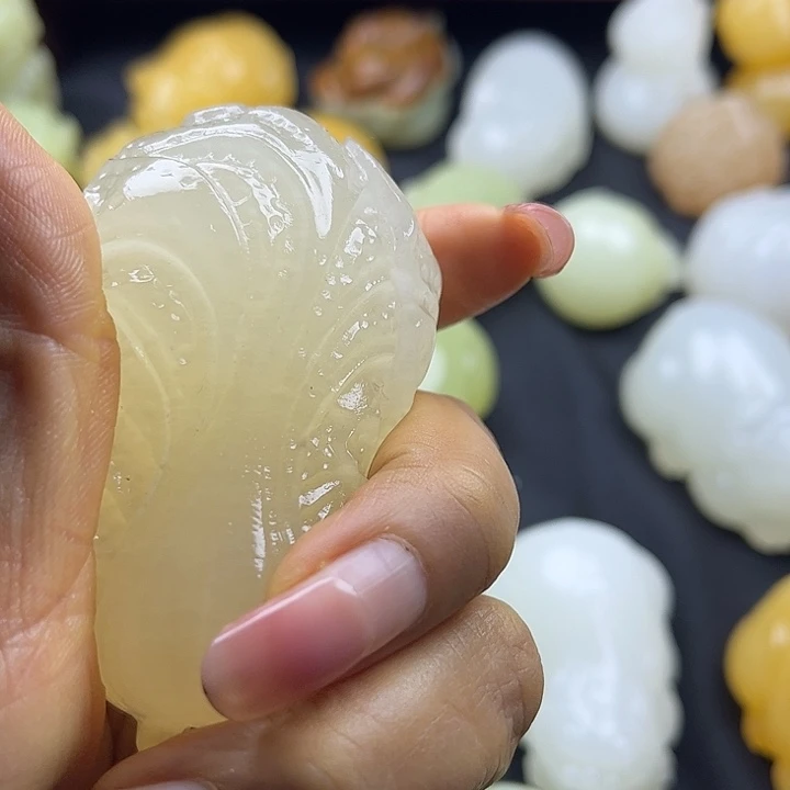 阳***装大理石磁石昆仑玉石手把件