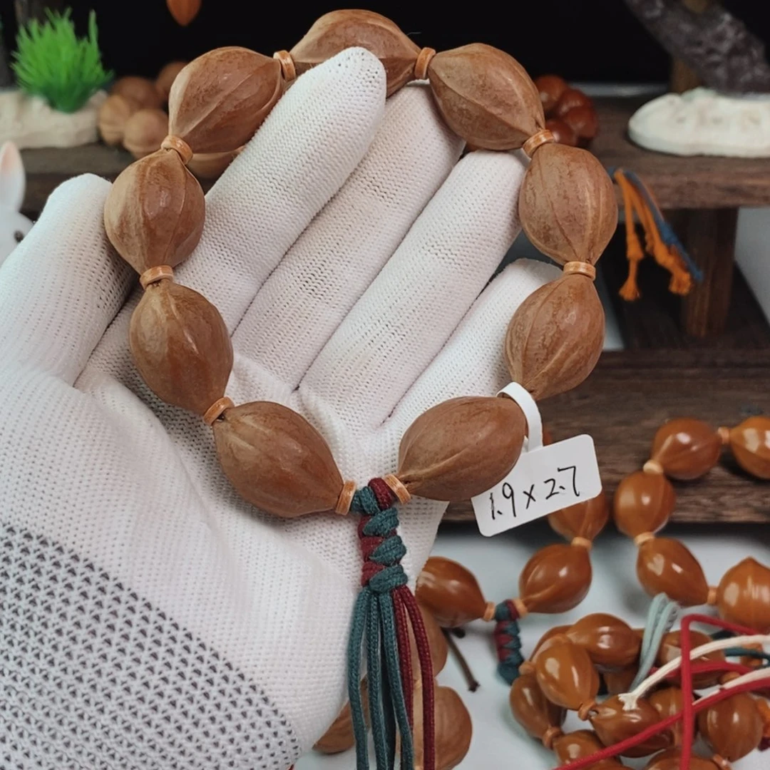 橄榄核手串李****1.9/2.7