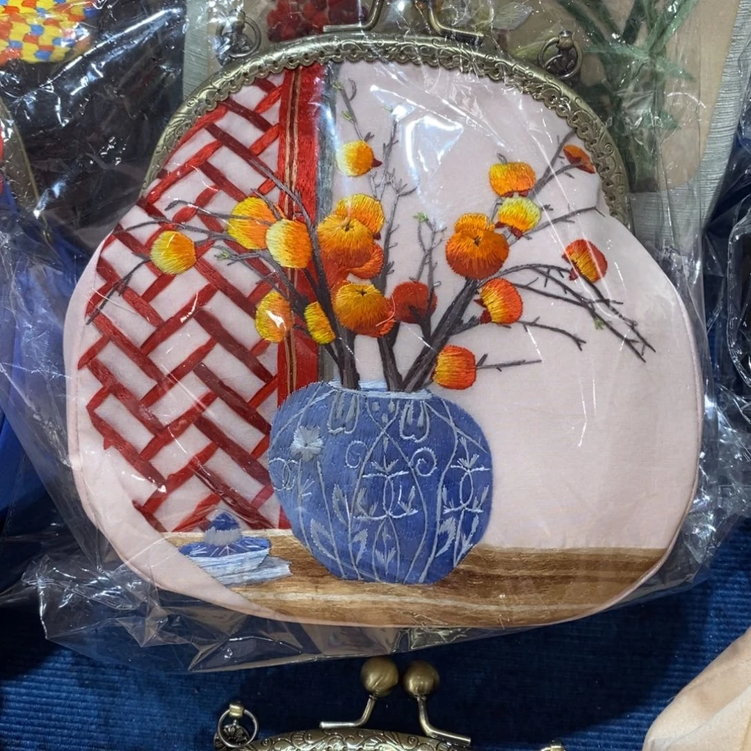 刺绣爱****8手工刺绣包包