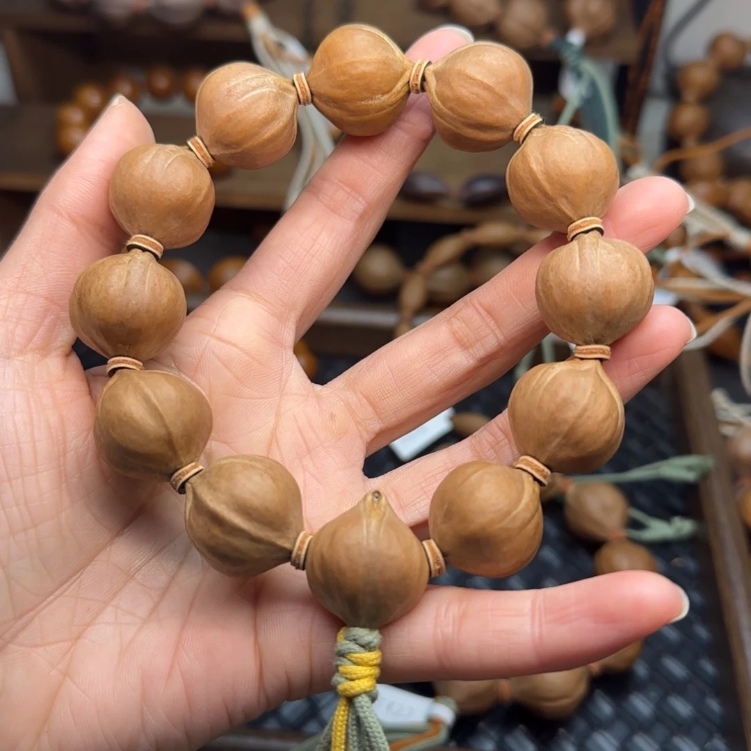 手串橄榄核10。2.1*2.3三花