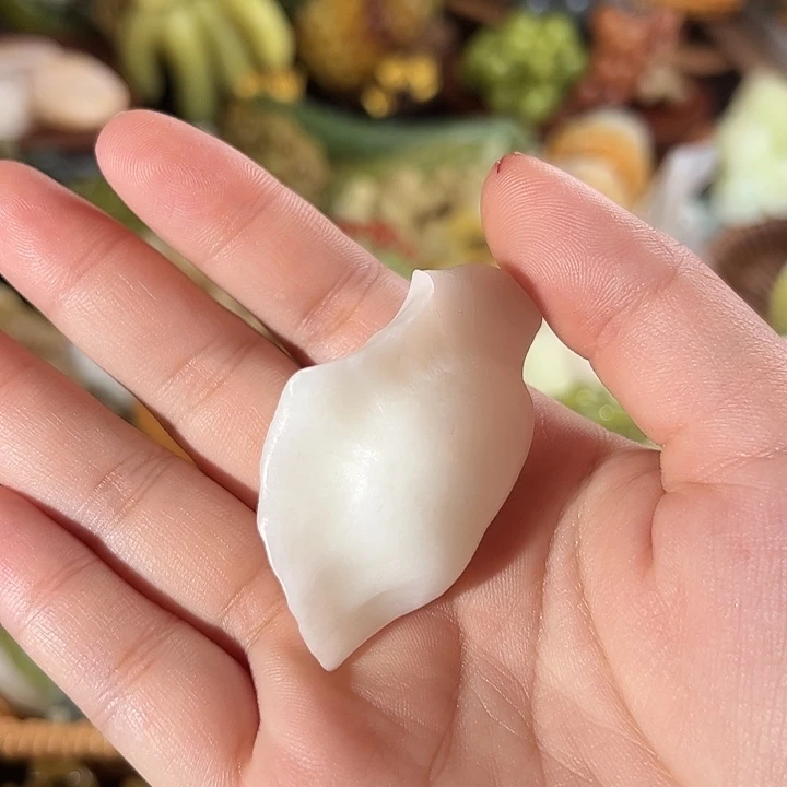 蛇纹石玉饺子未镶嵌橘*