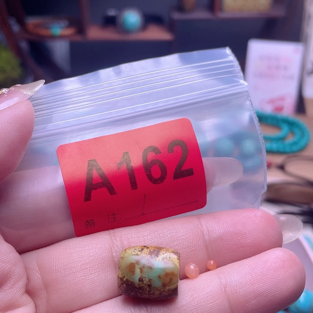 丿***张十堰原生态绿石头特色手工佩珠