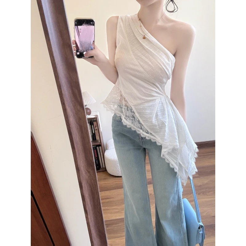 不规则蕾丝拼接斜领露肩无袖上衣夏季新款低腰浅蓝色微喇牛仔裤