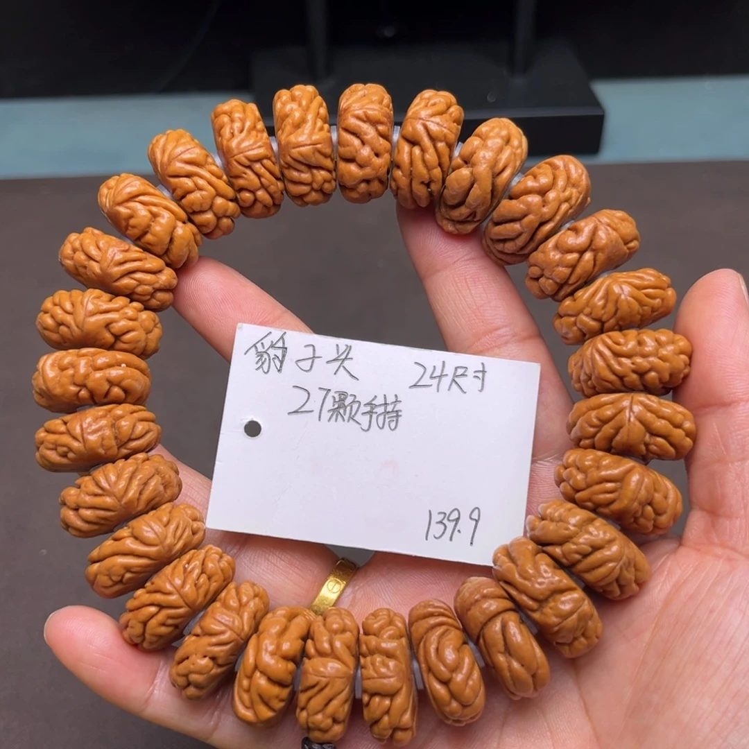 吊坠桃核豹子头手持