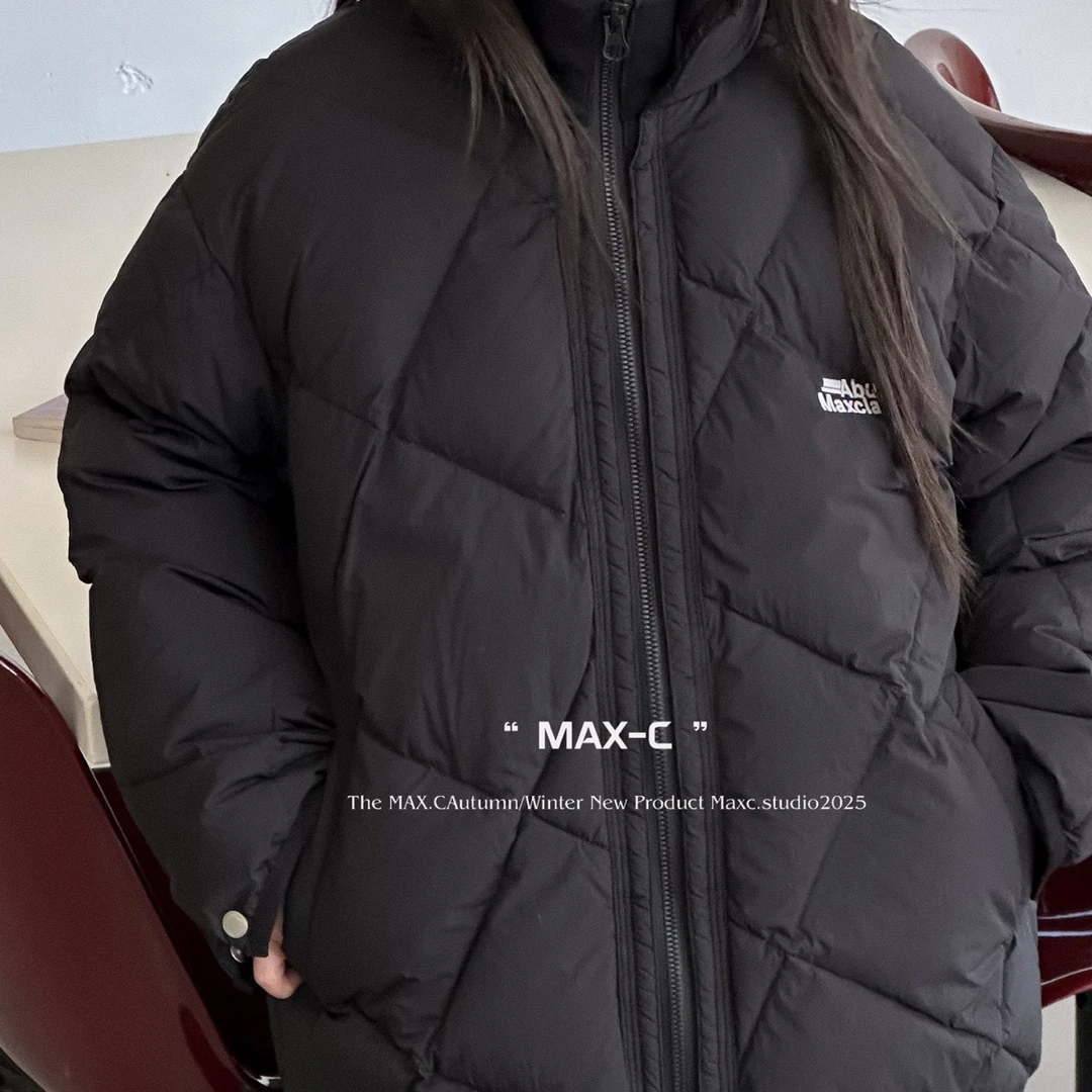 MC。66025黑色羽绒服童装外套户外保暖防泼水防泼油耐污