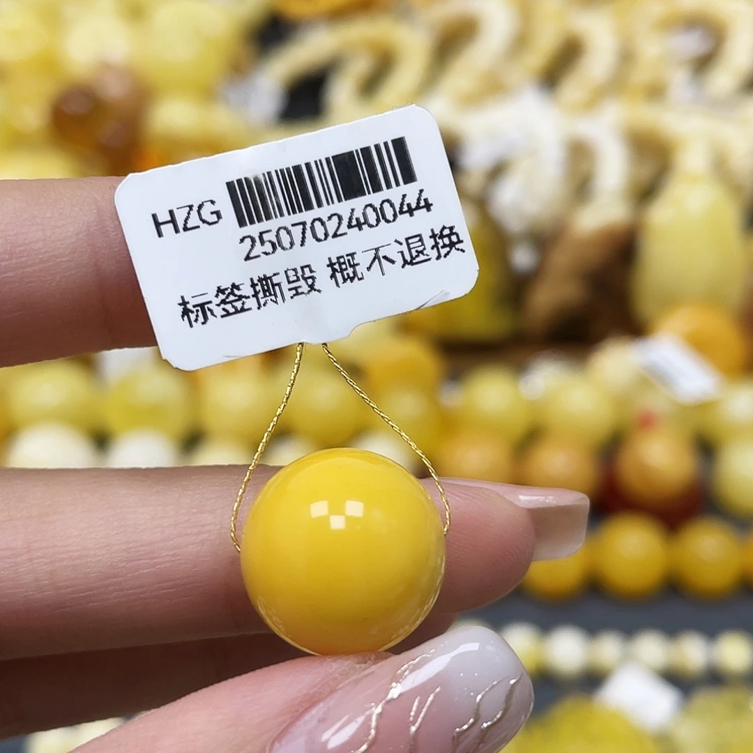 W***T琥珀未镶嵌裸石14.7mm圆珠蜜蜡