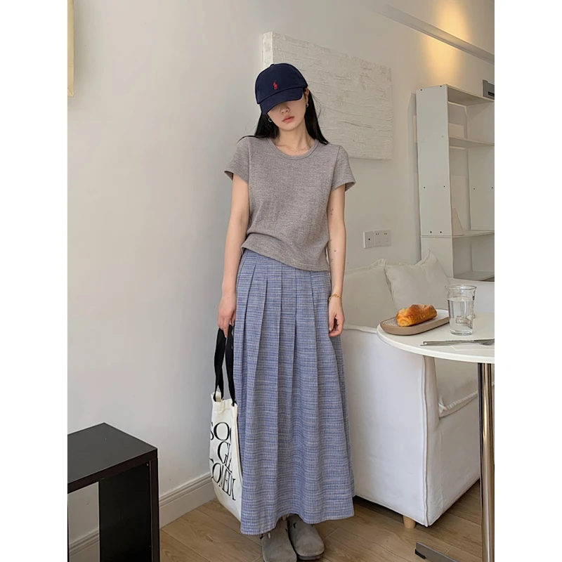 复古通勤格纹半身裙2025春季百搭显瘦法式a字中长裙女宽松裙子