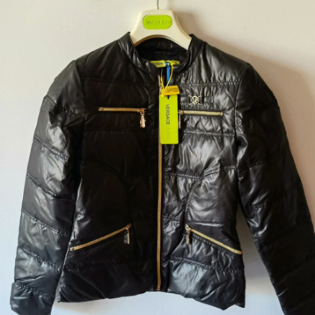99新 VERSACE/范思哲 轻薄羽绒服/A03471/42码