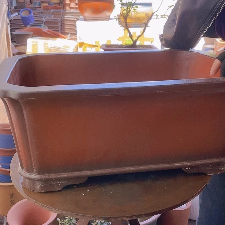 宜兴紫砂双抽角红马槽51