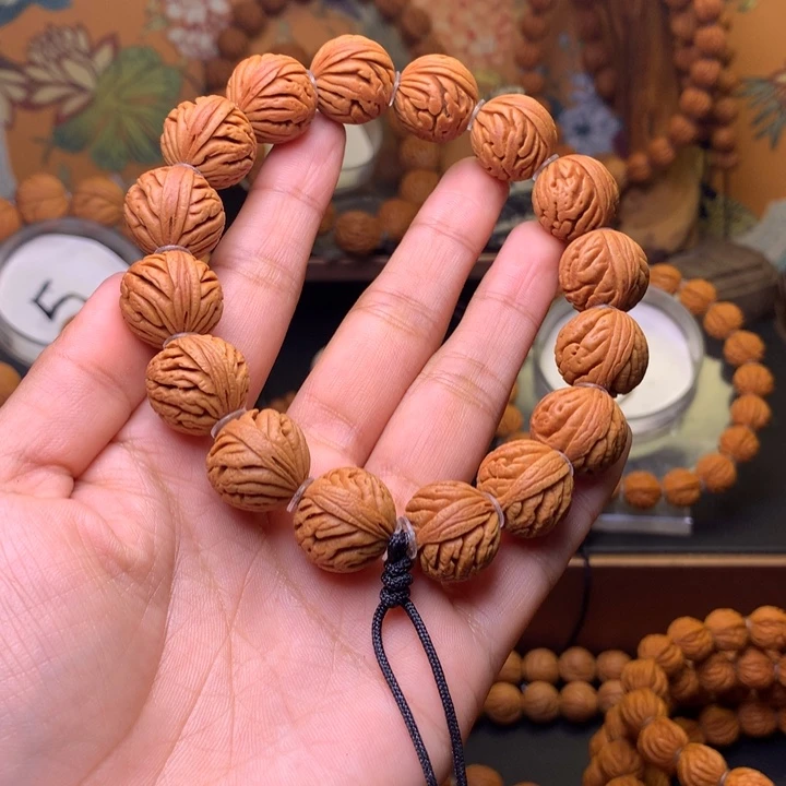 桃核手串瞅**滴桃核手串