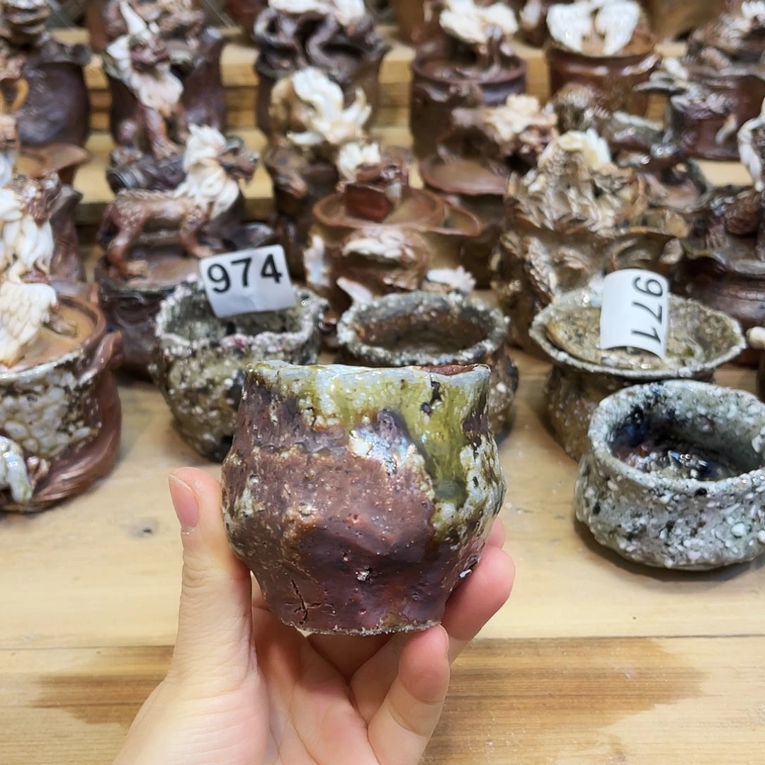 苏***尔瓶柴烧粗陶手捏杯渗水微瑕