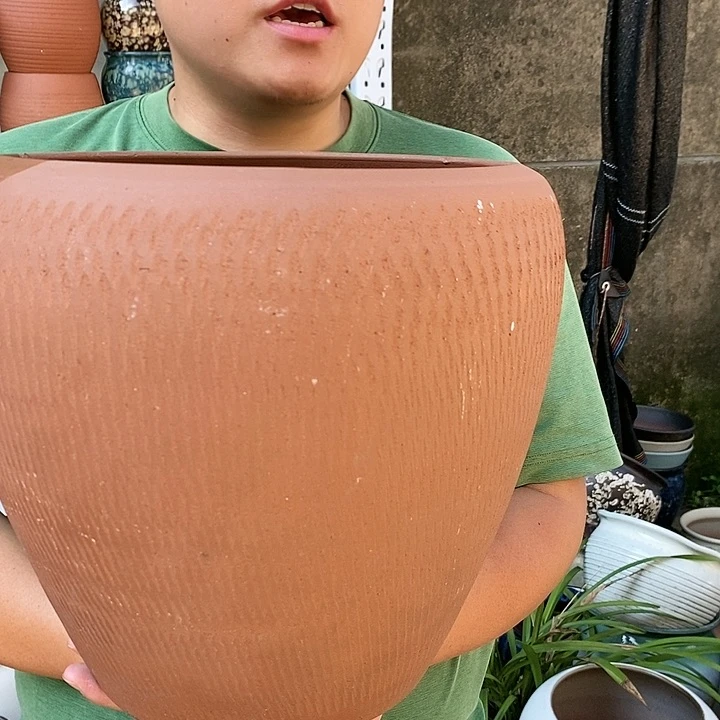 紫砂花盆口27高31瑕疵