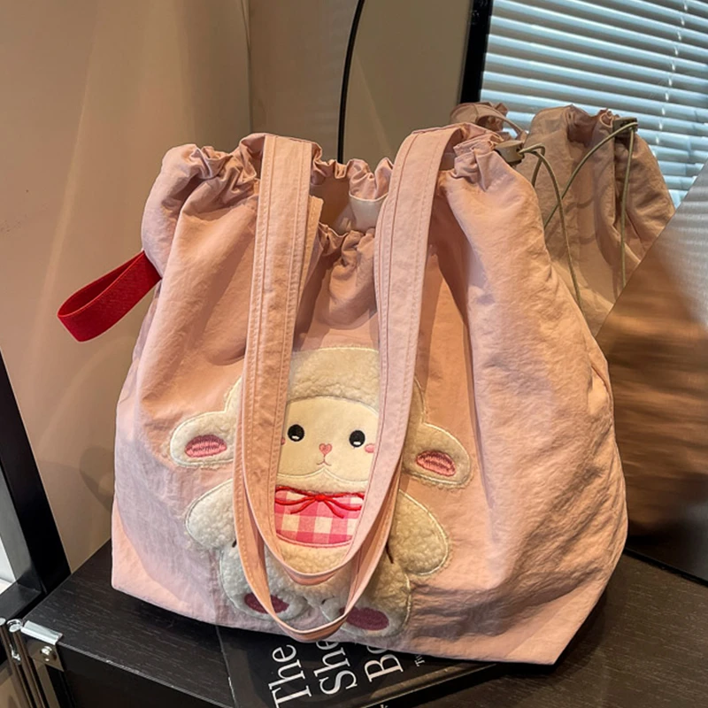 大容量托特包包女2025新款可爱小羊帆布包百搭学生上课通勤单肩包