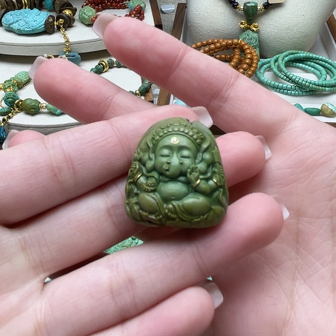 绿松石未镶嵌雕刻件四臂象神
