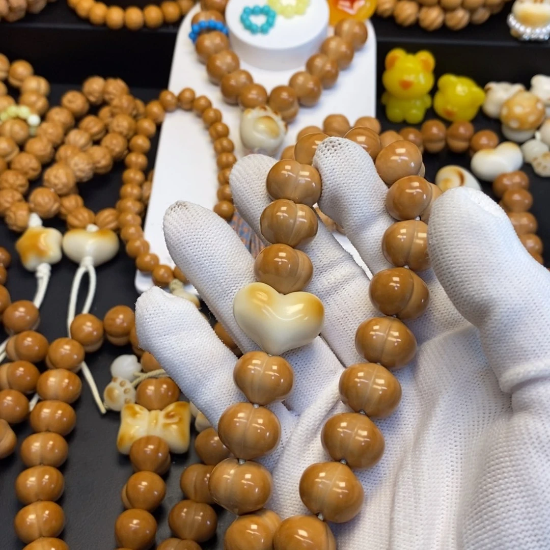 A***p吊坠猴头核桃全品屁桃