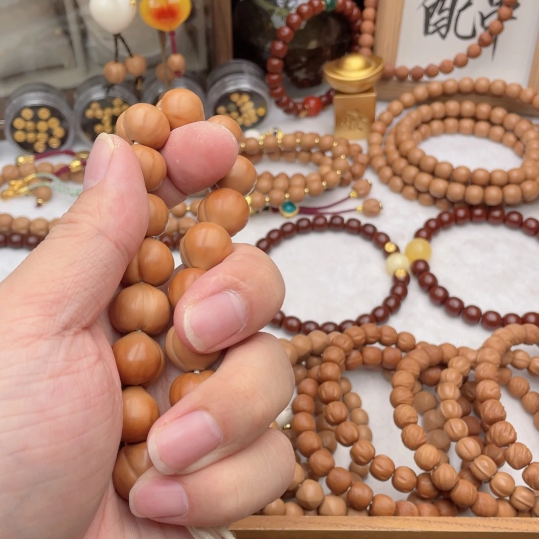 赚***猫手串猴头核桃屁桃手持