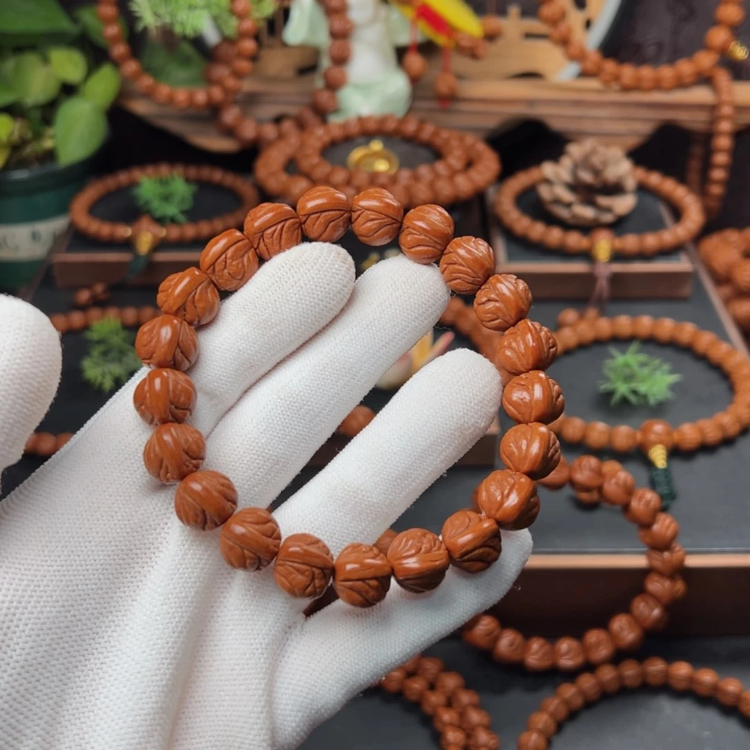 吊坠桃核黑****81.2玉龙脊手串