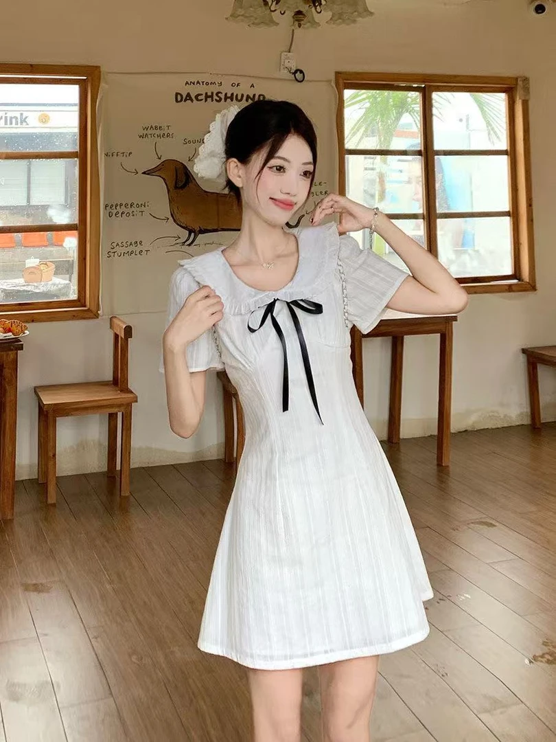 法式温柔风花边娃娃领短袖连衣裙夏季新款收腰显瘦气质长短裙女