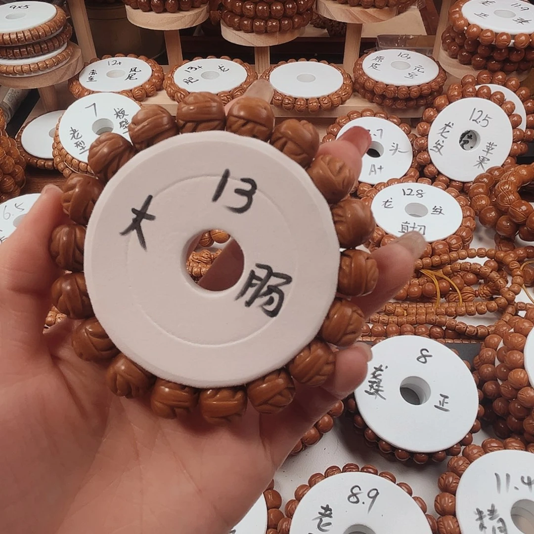 桃核手串过***。桃核光珠