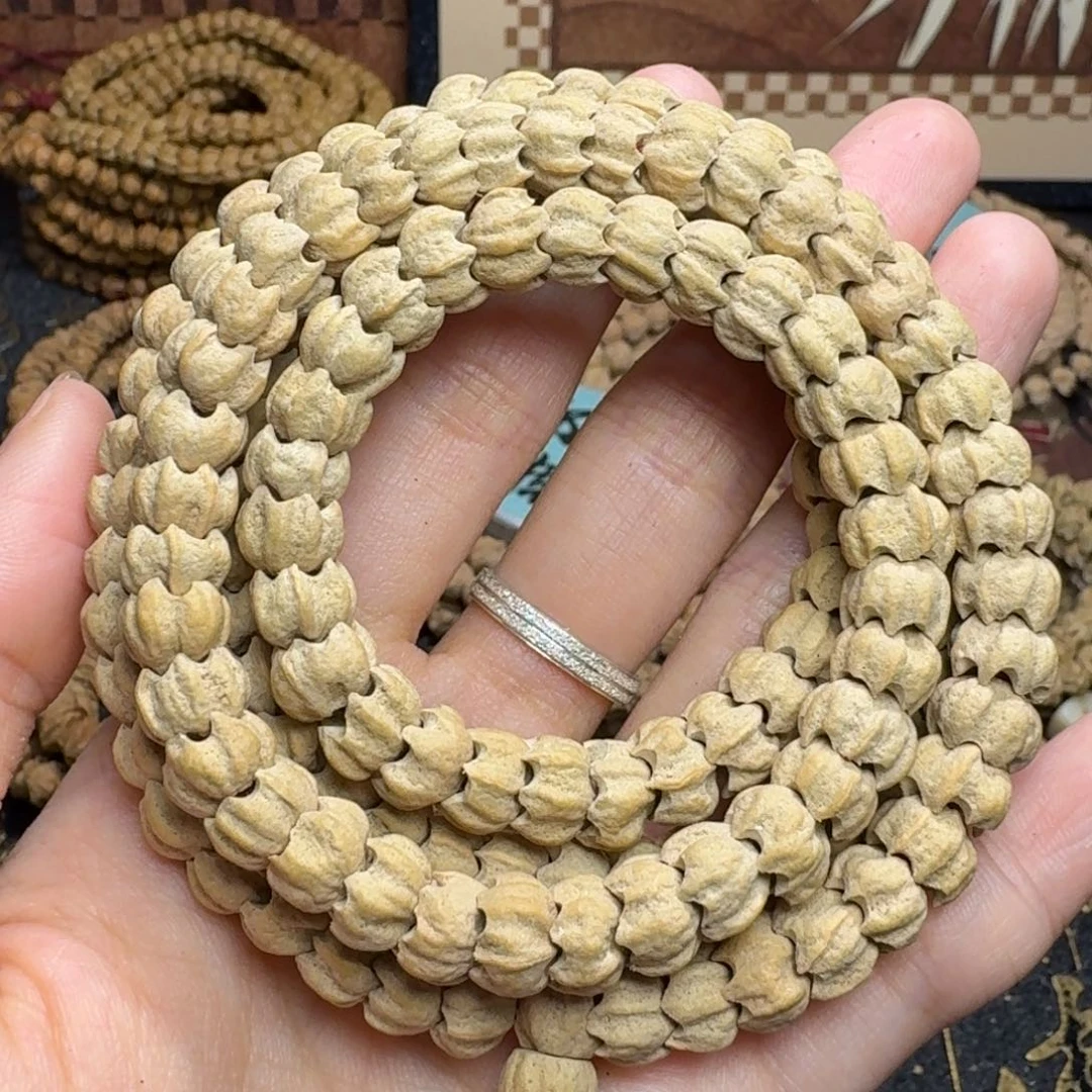 柏香籽/百香籽手串五爪金龙