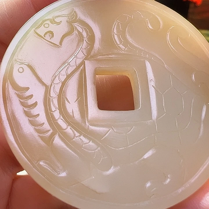 和田玉未镶嵌颈饰玻**心