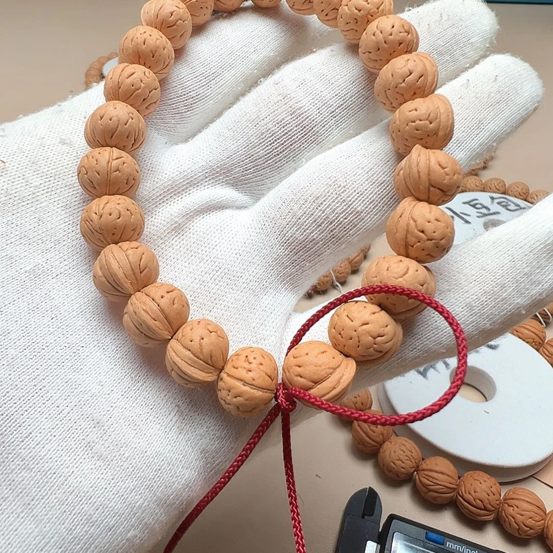 行***至桃核手串1.2鹦鹉精品