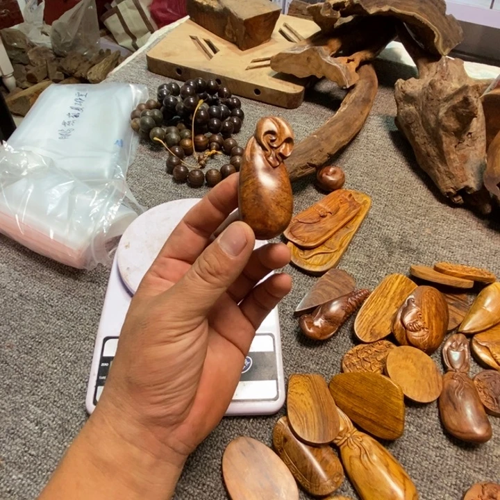 吾***千香榧木千秋黄花梨手把件