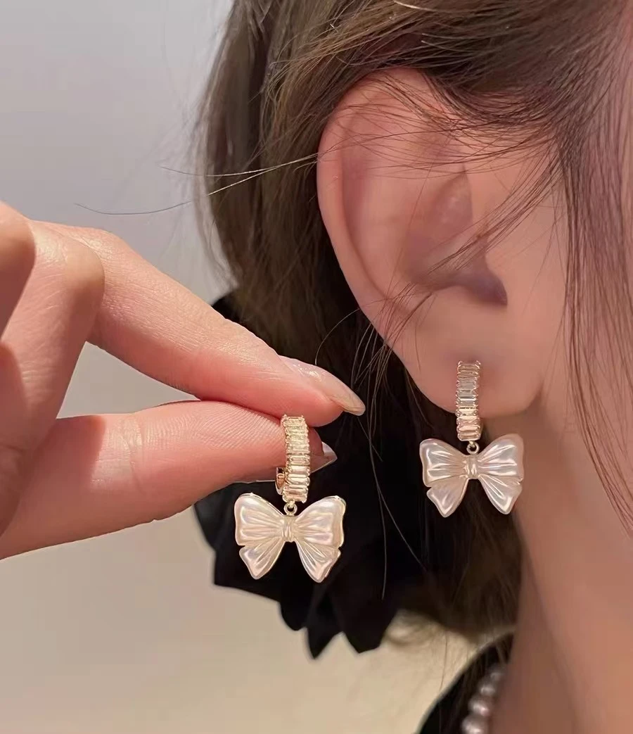 925银亚克力耳饰 925银针白色拼色甜美耳环首饰经典蝴蝶结