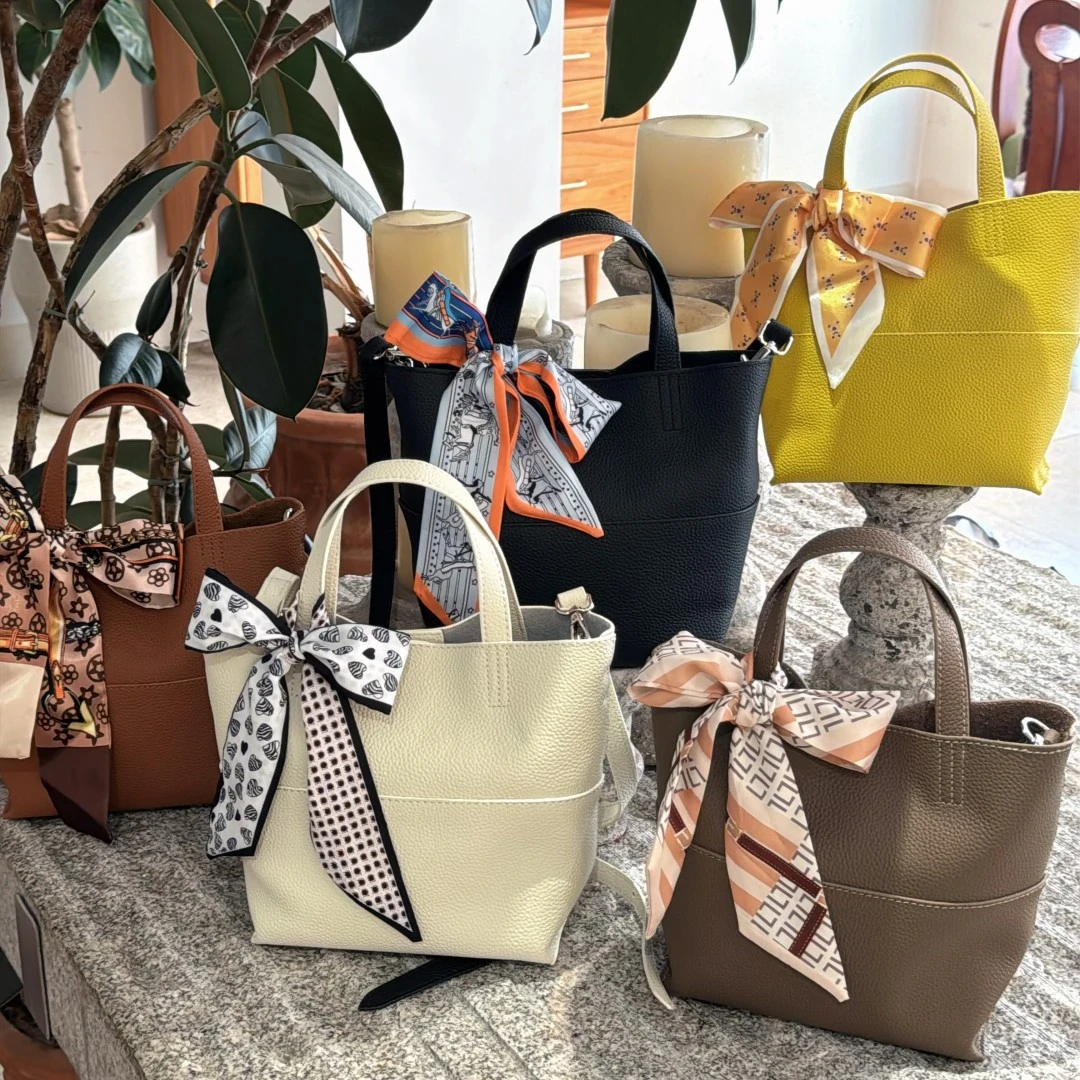 「奢尼奥」2025新款头层牛皮水桶包女士真皮菜篮子单肩斜挎包88806