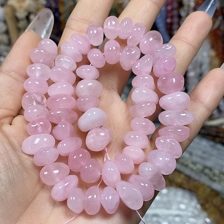 玛瑙/玉髓未镶嵌珠宝半成品天然粉晶糖豆一条