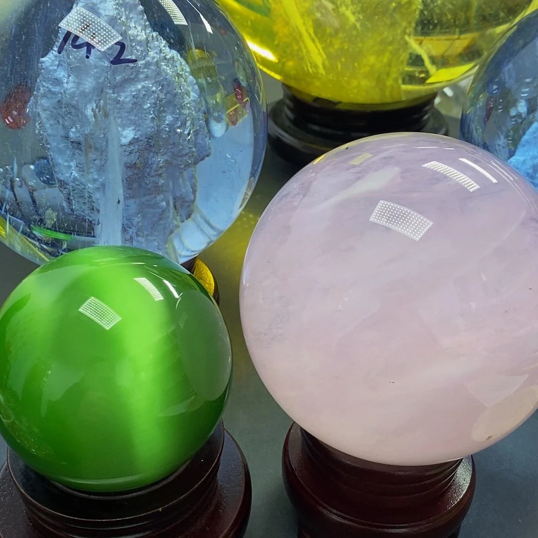 果***园石材8厘米猫眼11.6厘米粉水摆件