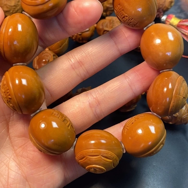 橄榄核摆件齐*刀八卦手串