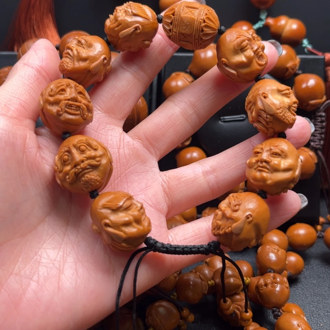 行****橄榄核手串须派罗汉