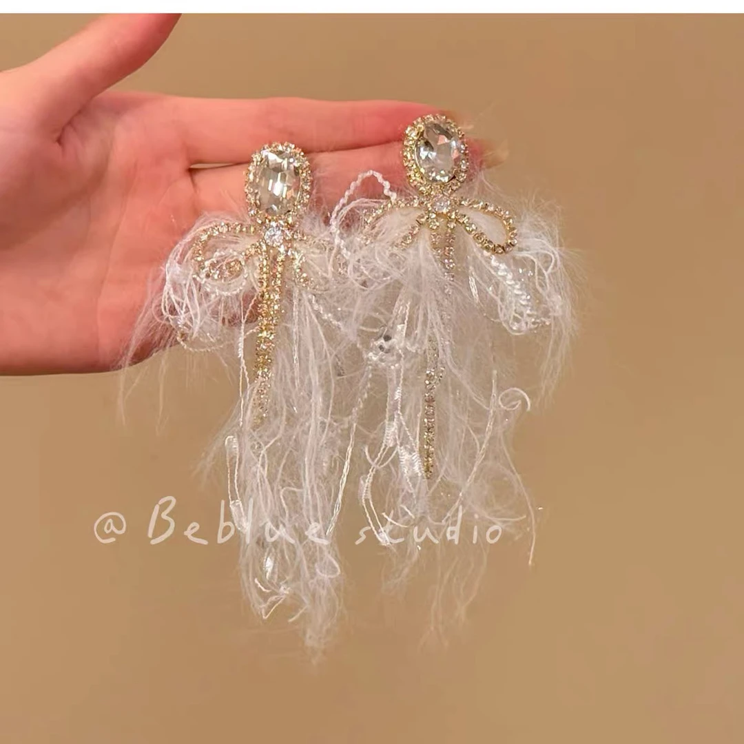 铜合金玻璃耳饰 秋冬新款白色毛线蝴蝶结流苏耳环高级小众耳饰