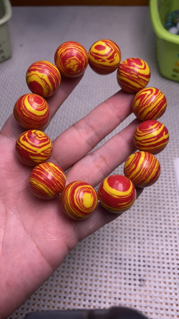 B142  20红孔雀手串