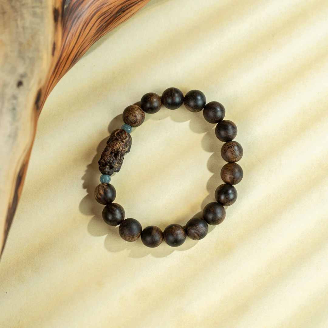 沉香越南芽庄白奇楠瘤疤料貔貅设计款10MM单圈手串