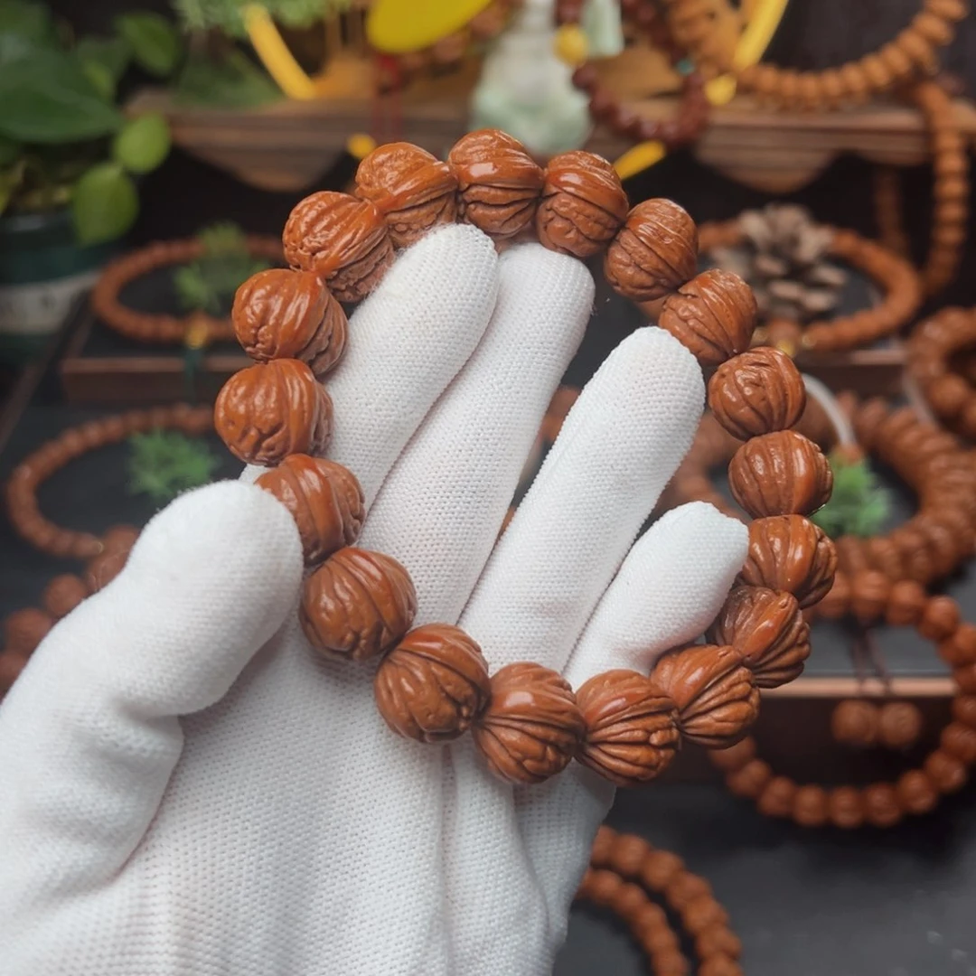 吊坠桃核思*1.7八爪龙纹手串